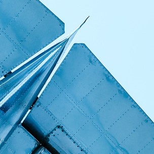 Close up of the tail of a plane.